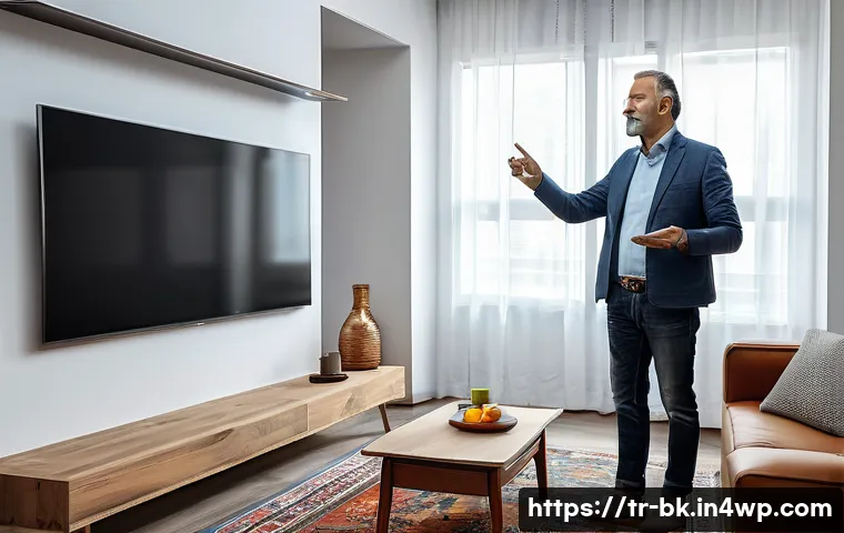 제스처 기반 인터페이스 개발 도구 소개 - A modern living room scene in Istanbul, featuring a middle-aged Turkish man comfortably controlling ...